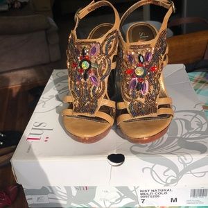 Beautifully unique wedge heel